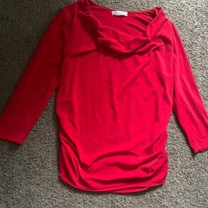 Size small red top with ruched ides and drape neck